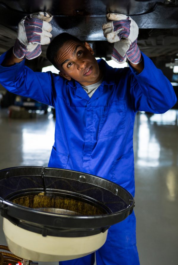 mechanic-servicing-car